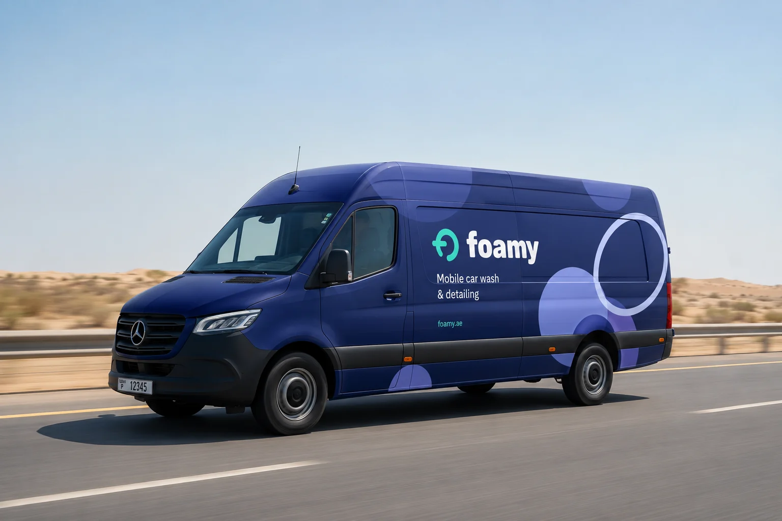 Indigo Foamy service van with the Mint Foamy Loop and white wordmark